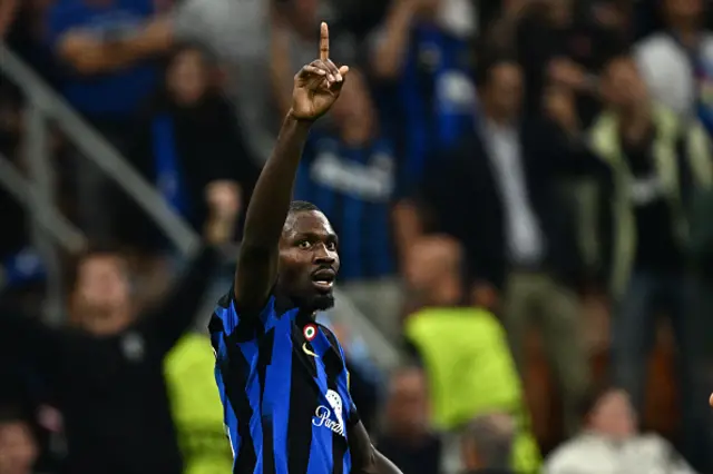 Inter Milan's French forward Marcus Thuram celebrates