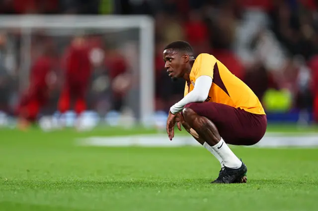 Zaha warms-up at Old Trafford