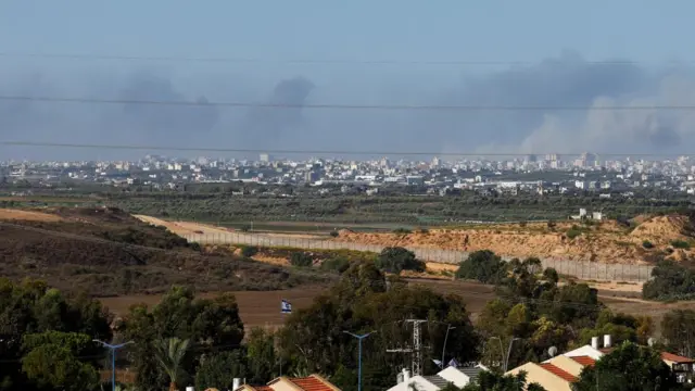 Smoke rises over Gaza, as seen from southern Israel