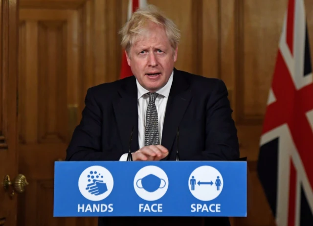 Prime Minister Boris Johnson speaks during a press conference