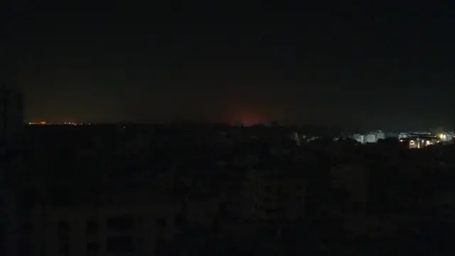 Flash above Gaza skyline