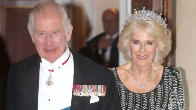 Queen Camilla and King Charles III arrive at a reception and dinner in honour of their Coronation on October 18, 2023 at Mansion House in London, England.