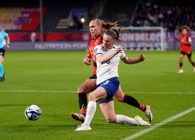 Niamh Charles crossing the ball