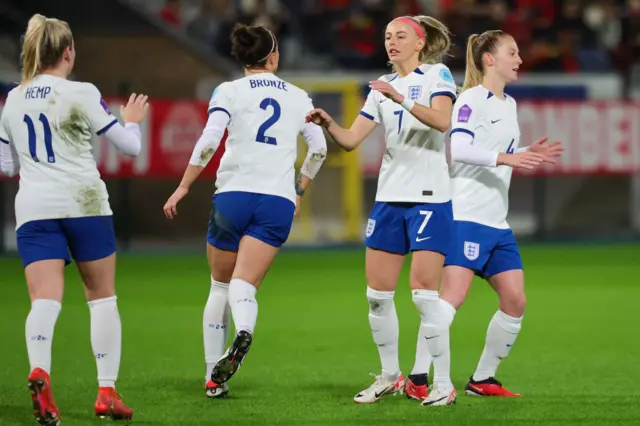 Lucy Bronze celebrating for England