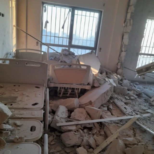 Photograph circulated by Hamas-run health ministry which it says shows damage inside the hospital