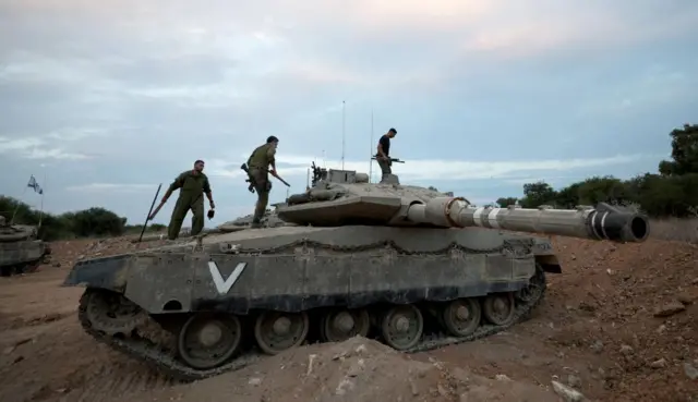 An Israeli military unit with a tank during manoeuvres in the Western Galilee, as they guard along the border with Lebanon, northern Israel