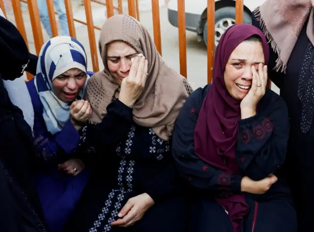 Female mourners in tears at a funeral of a person killed in Gaza