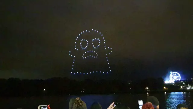 A ghost shape created by drones above Derry