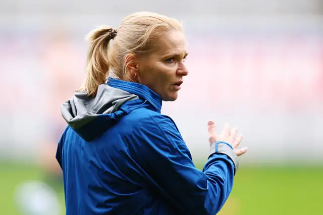 Sarina Wiegman looks on during training