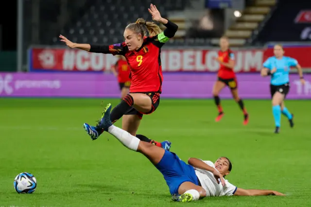 Jess Carter making a slide tackle