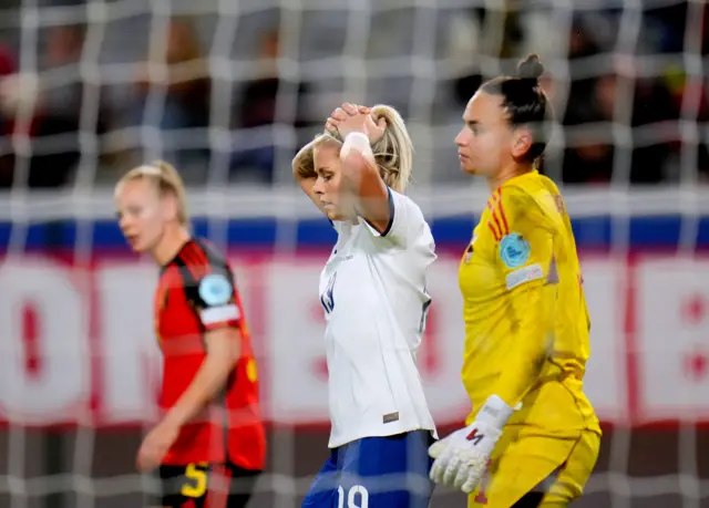 Rachel Daly with her hands on her head