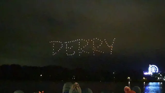 Drones spell out "Derry" in the night sky