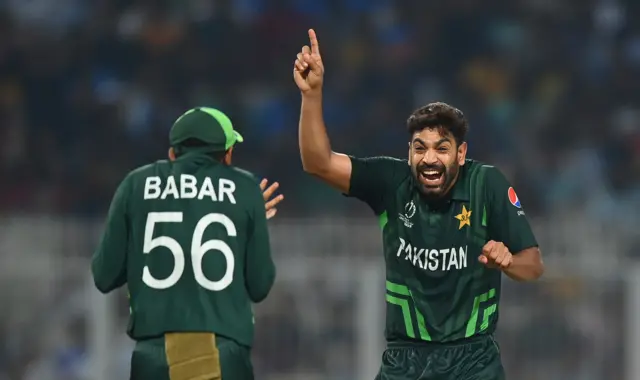 Haris Rauf and Babar Azam celebrate the wicket of Shakib Al Hasan