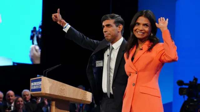 Prime Minister Rishi Sunak with his wife Akshata Murty on stage