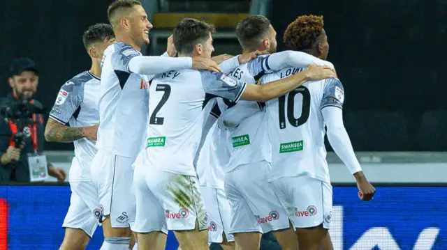 Swansea celebrate scoring