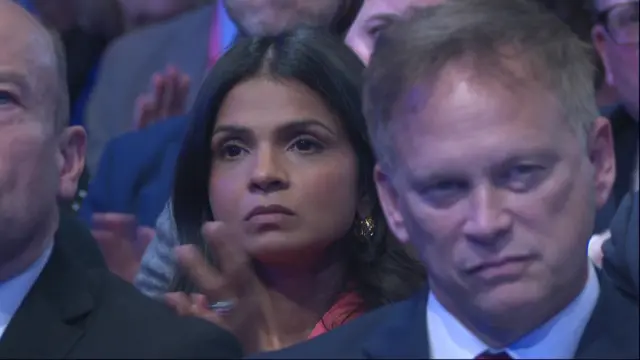 Akshata Murty listens to the PM's speech