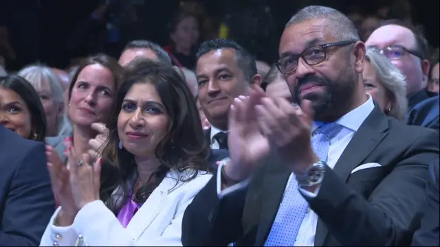 Suella Braverman and James Cleverly applaud the PM from the front row