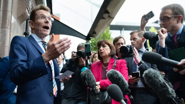 Andy Street speaks to media outside the Conservative Party Conference