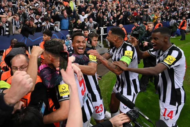 Newcastle celebrate Fabian Schar's goal against PSG