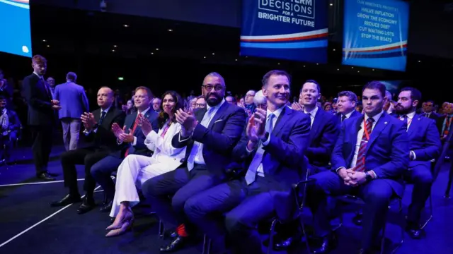 British Chancellor of the Exchequer Jeremy Hunt, Foreign Secretary James Cleverly, Home Secretary Suella Braverman, Defence Secretary Grant Shapps and Secretary of State for Northern Ireland Chris Heaton-Harris attend the Britain's Conservative Party's annual conference in Manchester