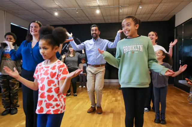 SNP leader Humza Yousaf joins SNP candidate Katy Loudon (second left) during a dance class at the Tempo Community Hub in Rutherglen for campaigning ahead of the Rutherglen and Hamilton West by-election