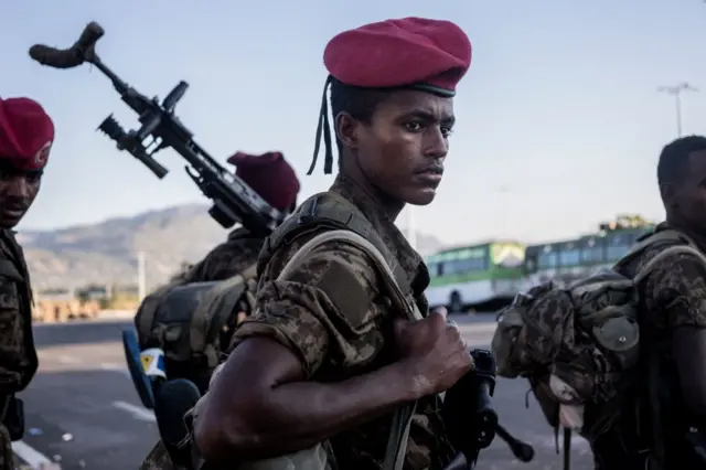 A soldier from the Ethiopian National Defence Force (ENDF) looks on in Kombolcha , Ethiopia, on December 11, 2021.