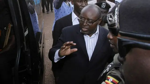 Rwenzururu King Charles Wesley Mumbere (3rd R) is taken into custody after he was granted bail by Jinja High court, following the clashes between Uganda People's Defence Force (UPDF) and Rwenzururu kingdom's royal guards, in Jinja, Uganda on January 13, 2017.