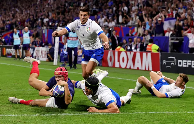 Louis Bielle-Biarrey of France dives as he scores the second try of the game