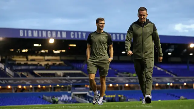 Jayson Molumby and Jed Wallace of West Brom take a stroll on the pitch at St Andrew's