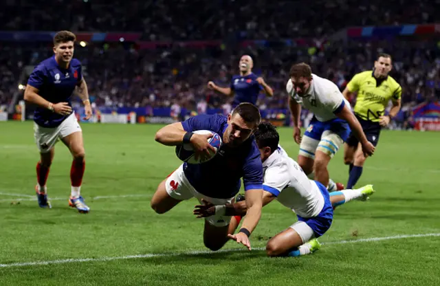 Thomas Ramos of France dives over the line as he scores a try