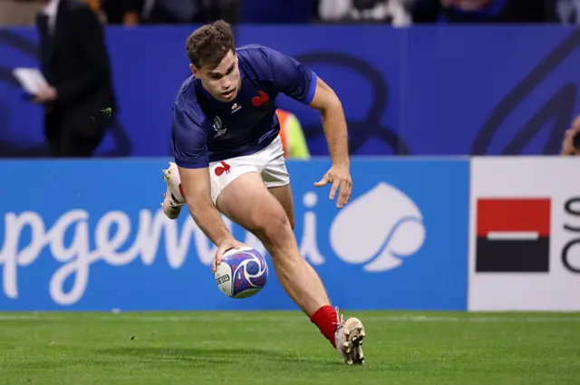 Damian Penaud of France scores the team's first try