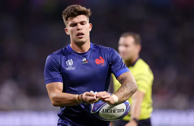 Matthieu Jalibert of France looks on during the game