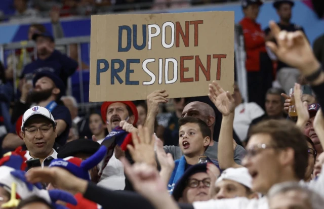 Dupont for President sign in the stadium