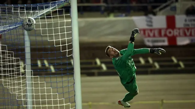 Alex Palmer is beaten by Gary Gardner's free-kick