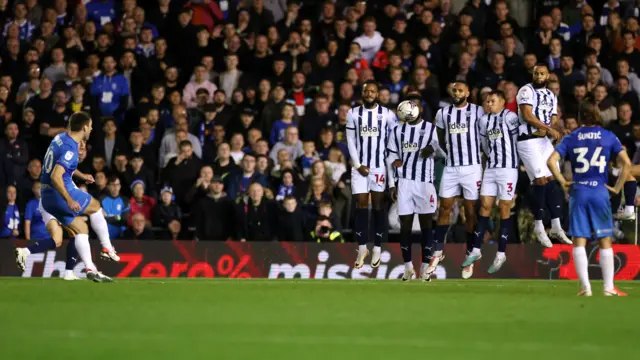 Gary Gardner scores a free-kick