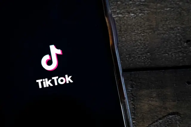 In this photo illustration, the TikTok app is displayed on an Apple iPhone on August 7, 2020 in Washington, DC. On Thursday evening, President Donald Trump signed an executive order that bans any transactions between the parent company of TikTok, ByteDance, and U.S. citizens due to national security reasons.