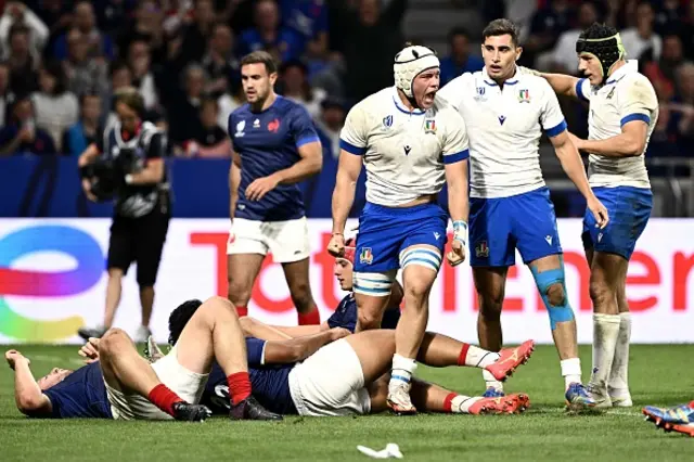 Italy's flanker Manuel Zuliani  celebrates after scoring with teammates