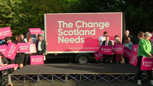 empty stage with Labour banners in Rutherglen