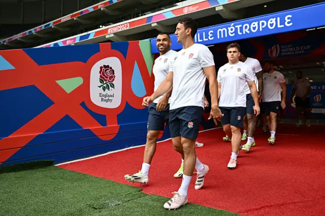 Joe Marchant and Alex Mitchell of England walkout of the tunnel