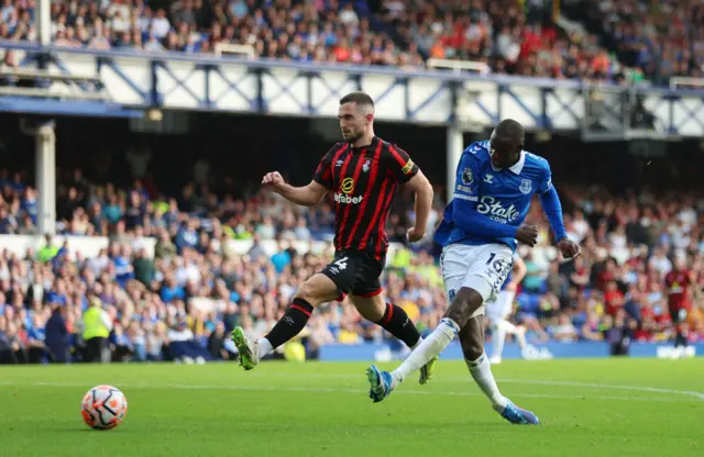 Doucoure shoots towards goal to add a third for everton.