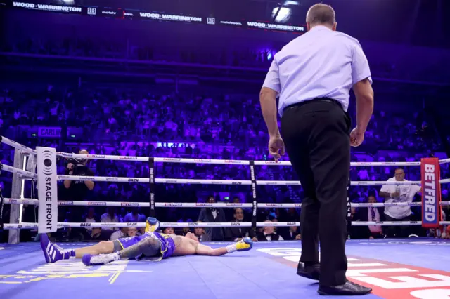 Josh Warrington on the canvas