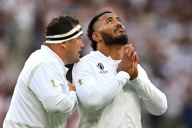 Jamie George and Manu Tuilagi line up for the anthem