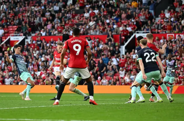 McTominay shoots towards goal for the equaliser.