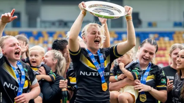 Key full-back Tara Jane Stanley (centre) has had her hands on the League Leaders' prize with York, and is now bidding for the outright title silverware