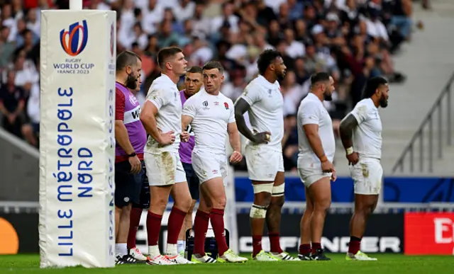 George Ford of England speaks with Tom Harrison, Coach of England