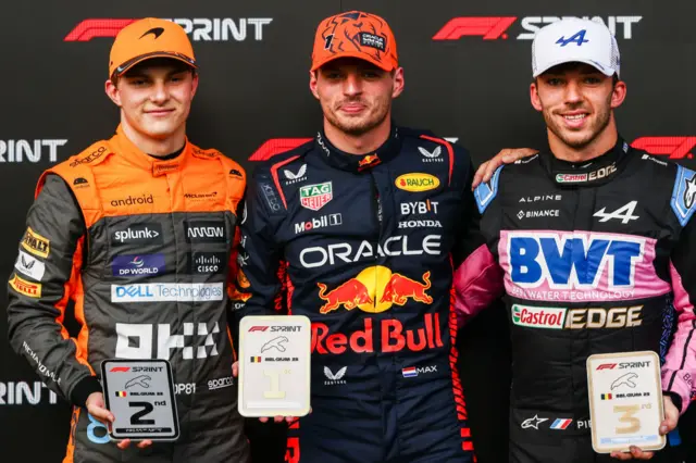 Oscar Piastri, Max Verstappen and Pierre Gasly celebrate podium finishes in the Belgium sprint race