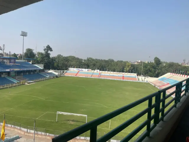 A football ground behind a stand at Arun Jaitley Stadium, Delhi