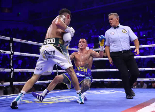 Leigh Wood knocks down Josh Warrington