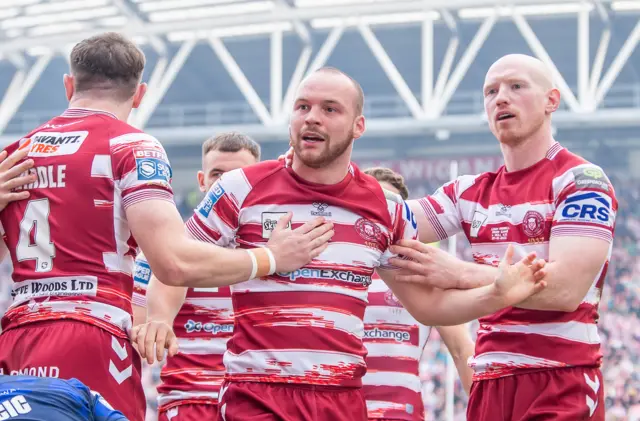 Wigan celebrate Liam Marshall's try