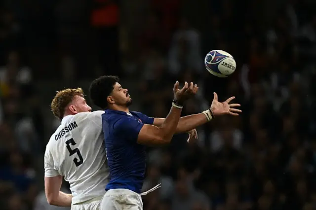 England's lock Ollie Chessum  and Samoa's lock Theo McFarland fight for the ball